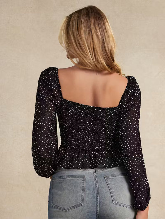 Blouse élégante à col bateau et manches bouffantes pour femme