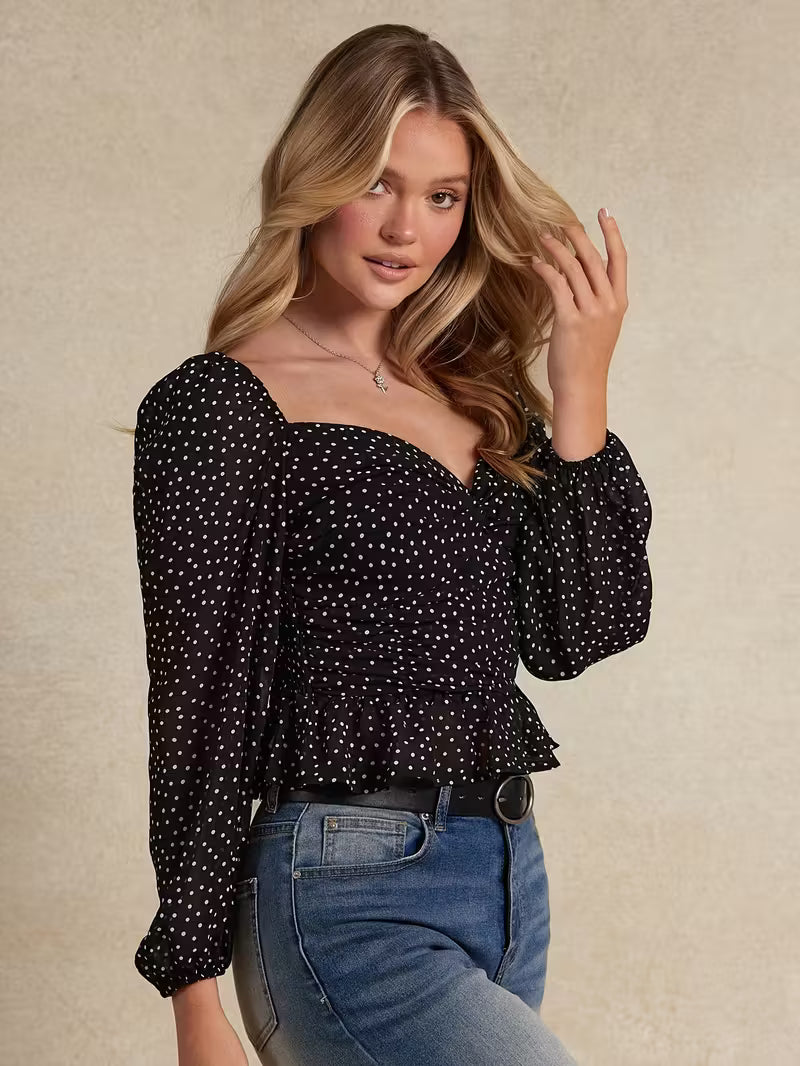 Blouse élégante à col bateau et manches bouffantes pour femme